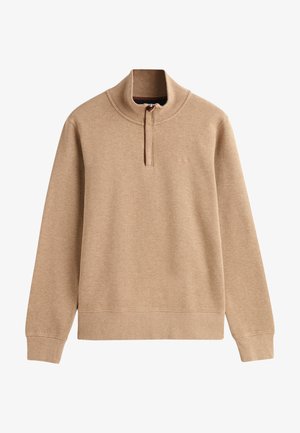 Tan kleur pullover sweatshirt met een hoge kraag en ritssluiting. Gemaakt van zacht materiaal, met ribbels aan de manchetten en onderrand voor een comfortabele pasvorm.