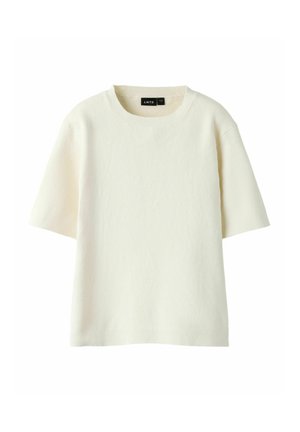 Kortermet, kremfarget strikkegenser med rund hals og synlig ribbestruktur, merket LMTD størrelse 13-14.