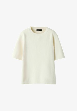 Krémový krátky pletený sveter s okrúhlym výstrihom a viditeľnou rebrovanou textúrou, označený ako LMTD veľkosť 13-14.