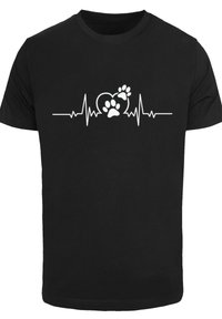 Schwarzes Baumwoll-T-Shirt mit einem weißen Herzschlagmuster und einem Herzen sowie einem Pfotenabdruck in der Mitte. Bequeme Passform, kurze Ärmel.
