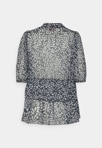 Blusa floreale navy con maniche corte a sbuffo, texture plissettata e orlo a strati. Caratterizzata da un motivo di fiori bianchi su un materiale trasparente.