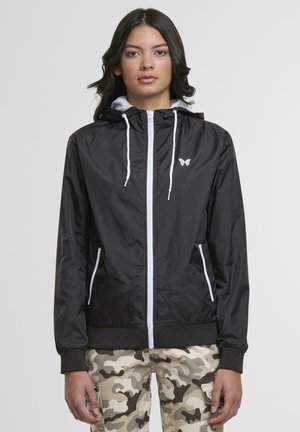 FLY AWAY WINDRUNNER - Windbreaker - black/white