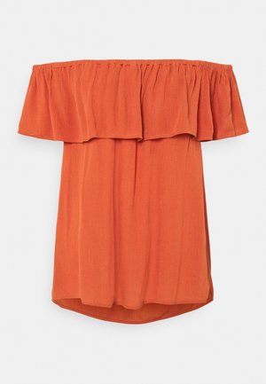 Off-the-shoulder orange top with a ruffled neckline, made from lightweight fabric. Features a relaxed fit and curved hem.