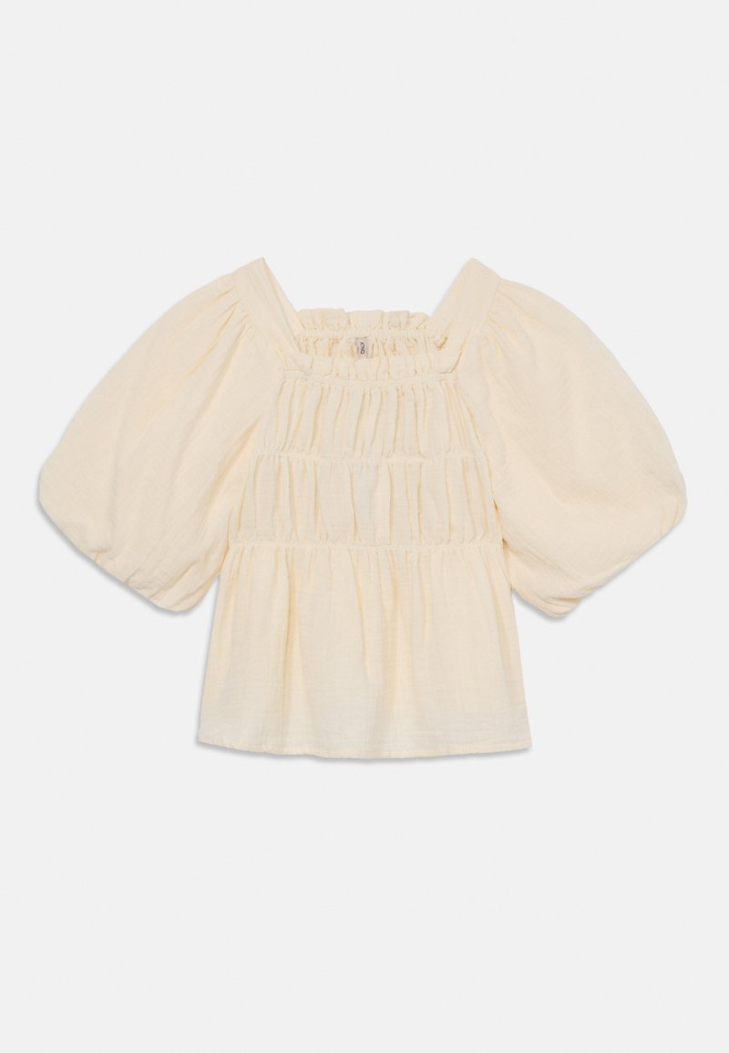 Blusa beige chiara con maniche a sbuffo, dettagli arricciati e scollatura quadrata. Realizzata in tessuto leggero e testurizzato.