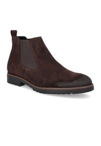 Brązowe zamszowe botki za kostkę z elastycznymi panelami bocznymi, zaokrąglonym noskiem i teksturowanym mudguardem. Solidna gumowa podeszwa z delikatnym obcasem.