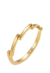 Goldfarbener Ring mit einem eleganten, geometrischen Design und offenen Enden. Das Material weist eine glatte, glänzende Oberfläche mit minimalistischem Stil auf.
