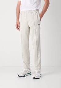 Lacoste Tepláky - hammam