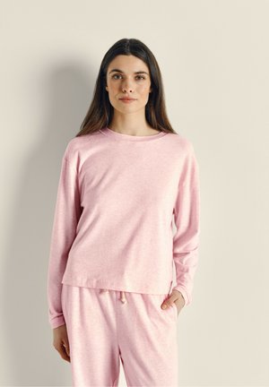 Pink long-sleeve top in a soft, lightweight material with a relaxed fit and round neckline, paired with matching sweatpants featuring drawstrings.