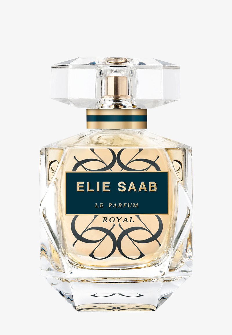 Flacon de parfum en verre transparent contenant un liquide doré, décoré de volutes noires élégantes et étiqueté "ELIE SAAB LE PARFUM ROYAL" en or et noir.
