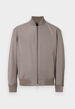 Γκρι μπουφάν bomber από λείο ύφασμα, με ριμπ γιακά και μανσέτες, με φερμουάρ μπροστά και πλαϊνές τσέπες.