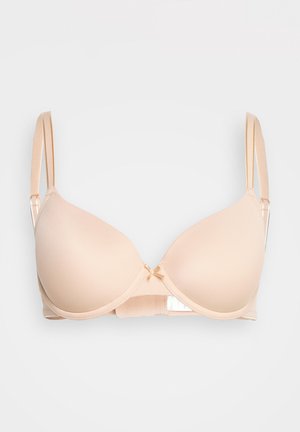 Nude-farbener, gepolsterter BH mit verstellbaren Trägern und einer kleinen Schleifendetail in der Mitte vorne vor einfarbigem Hintergrund.