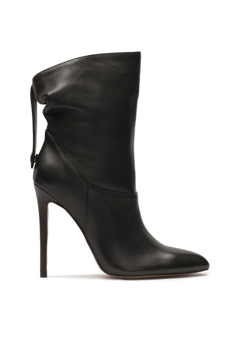 Black leather high-heeled boot with a pointed toe, slouchy ankle design, and a smooth texture. Features a stiletto heel and side detailing.