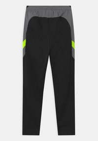 Nike Performance DRY ACADEMY - Pantalones deportivos - black/dark smoke grey/volt/light smoke grey