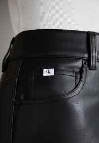 Calvin Klein Jeans STRAIGHT PANTS - Pantaloni - black
