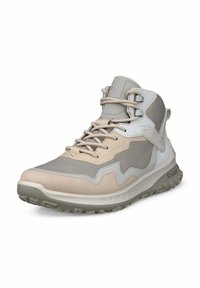 Scarpa alta impermeabile beige e grigia con pannelli in rete, design testurizzato e chiusura con lacci. Dotata di suola in gomma flessibile per una buona aderenza.