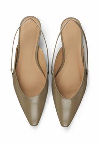 Olive green leather slingback shoes with a pointed toe, smooth texture, and beige insole, featuring thin, adjustable straps.