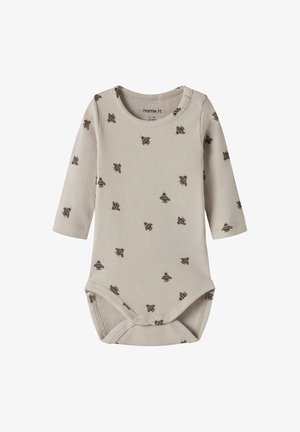 Béžové žebrované body na dlhý rukáv pre bábätká so zapínaním na patentky a drobnými rozptýlenými potlačami včiel po celej ploche.