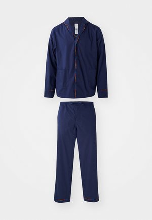 Navy pajama set featuring a button-up top with two pockets and colorful hem accents, paired with elastic waist pants.