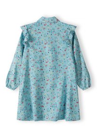 Abito azzurro chiaro con stampa floreale, spalline arricciate, maniche lunghe e colletto. Realizzato in tessuto morbido con polsini elasticizzati.
