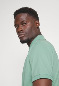 Selected Homme SLHFAVE ZIP - Polo - granite green