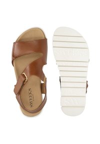 Brown leather sandals with adjustable strap, smooth upper, and light cushioned footbed. White rubber sole with textured grip pattern.