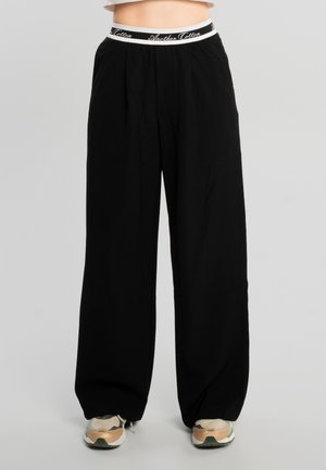 WIDE - Stoffhose - black