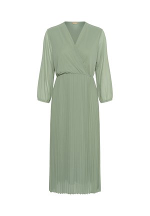 Plisseeritud roheline ümberpööratav kleit pikkade varrukatega ja V-kaelusega, valmistatud kergest kangast, millel voolav siluett ja tekstuuriga disain.