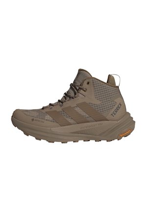 Brauner Adidas Terrex Trailrunning-Schuh mittlerer Höhe mit Gore-Tex-Obermaterial, gedämpfter Sohle und Continental-Gummilaufsohle für guten Grip.
