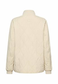 Kremowa pikowana kurtka z przeszyciami w kształcie diamentów, z prążkowanym kołnierzem i mankietami, widok od tyłu.