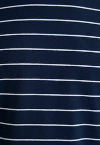 Navy blue fabric with white horizontal stripes, featuring a smooth texture. The stripes are evenly spaced, providing a classic design.