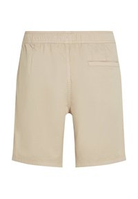 Beiga shorts med elastisk midjeband, med en bakficka och en slät, lätt textur. Enkelt, rak skärning.