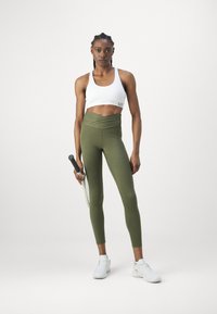 Björn Borg STUDIO CROSS - Leggings - olive night