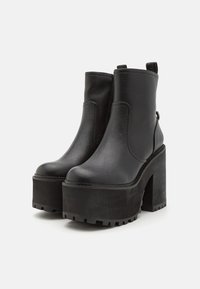 Buffalo KILLAH ZIP BOOT MID - Platform ankle boots - black