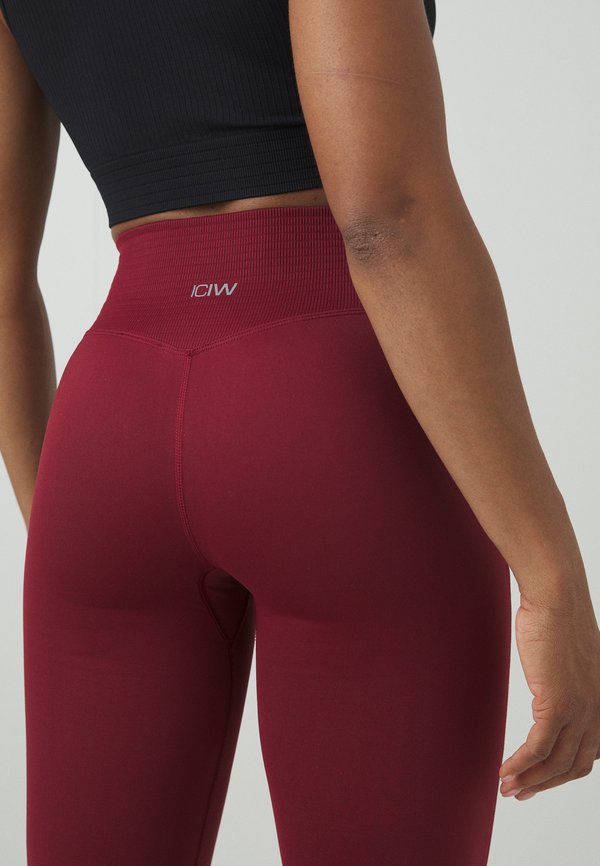 DEFINE SEAMLESS FLARED - Leggings - burgundy3