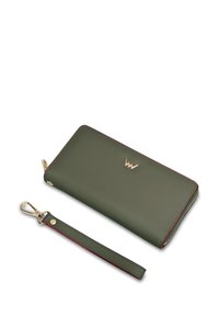 Green leather wallet with red stitching, featuring a gold logo and a detachable wrist strap with a snap clip. Smooth texture, rectangular shape.