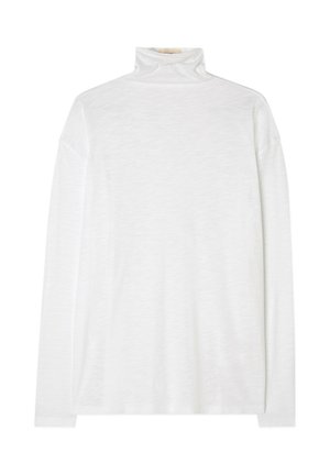 Dolga majica s slim-fit krojem in turtleneck ovratnikom v belem. Narejena iz mehke, lahke tkanine z gladko teksturo in minimalnimi šivi.