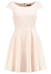 Robe patineuse rose clair avec des manches courtes, un corsage ajusté et une jupe évasée. Équipée d'une fermeture éclair dans le dos.