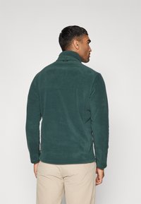 Jack Wolfskin WINTERSTEIN  - Jachetă din fleece - black olive/black olive