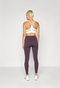 Fabletics SEAMLESS HIGH WAISTED LEGGING - Tajice - deep plum