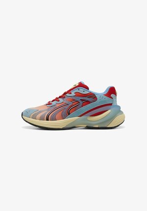 Sport shoes with a multicolor upper in red, blue, and peach, featuring a wave-like design and a thick, textured sole.