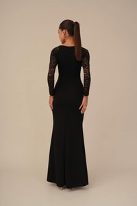 Black evening gown with lace long sleeves, fitted bodice, flared skirt, and a smooth texture. Back zipper closure visible.