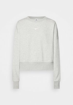 Grauer, taillierter Sweatshirt aus weichem Material, mit langen Ärmeln, gerippten Bündchen und einem kleinen weißen Nike-Logo auf der Brust.