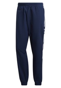 Námořnické modré lehké sportovní kalhoty s elastickým pasem, bílými bočními pruhy a elastickými manžetami na kotnících pro zúžený střih.