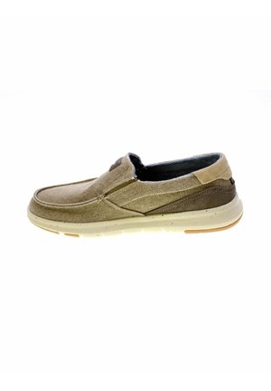 Scarpa casual slip-on in tela beige con suola bianca screziata e dettaglio sul tallone marrone scuro, vista laterale su sfondo bianco.