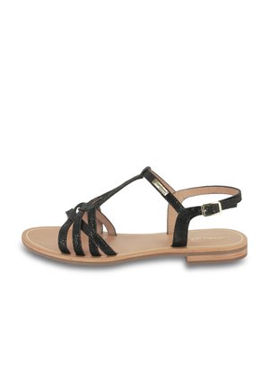 Black strappy sandals with glittery texture, featuring a flat heel and adjustable ankle strap. Smooth insole and minimalistic design.