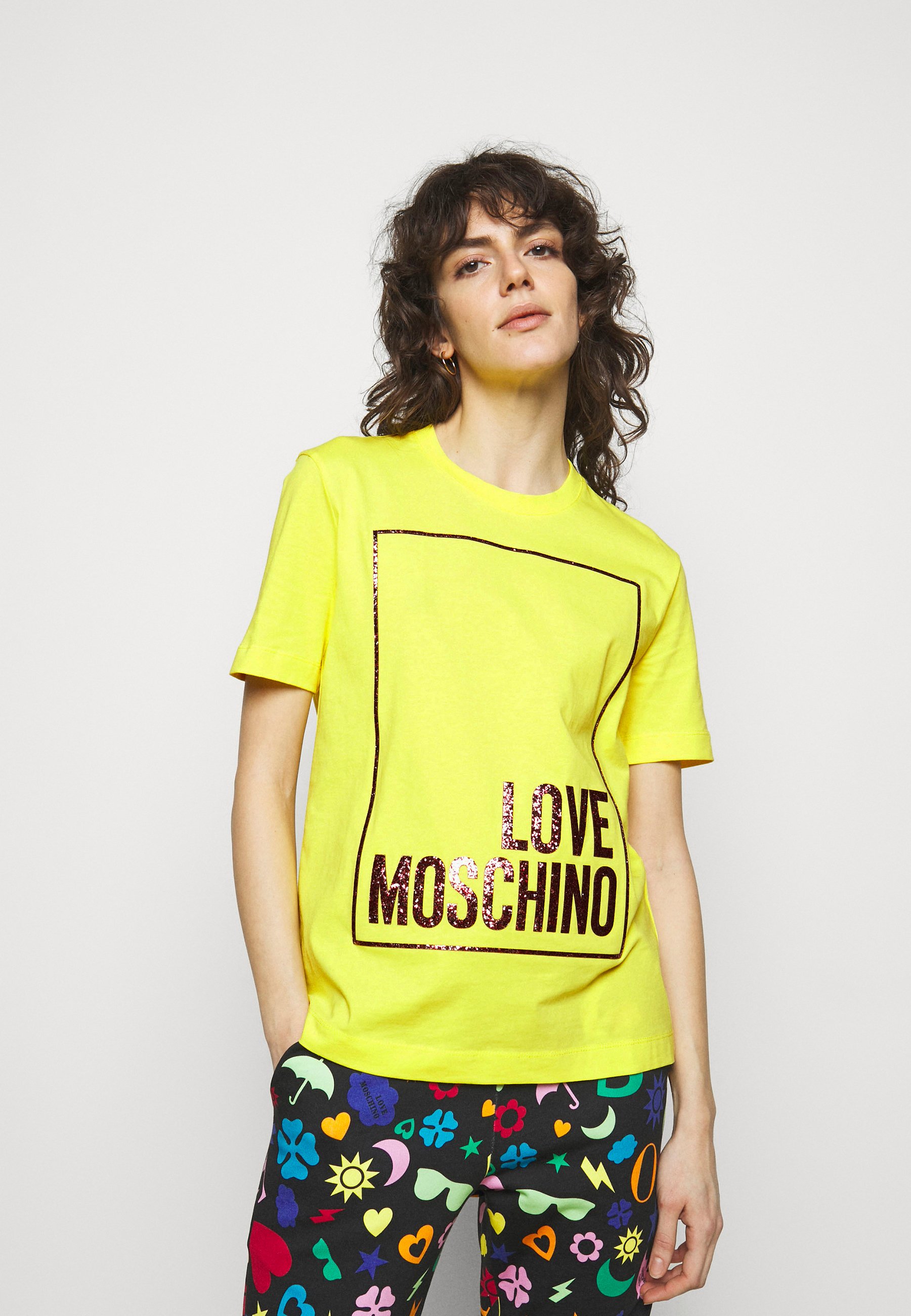 yellow moschino shirt