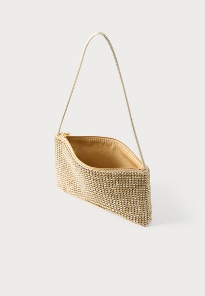 Τσάντα χειρός με χρυσό τόνο και φερμουάρ στην κορυφή, καλυμμένη με υφή από στρας, με λεπτό πλεγμένο λουράκι και λείο εσωτερικό επένδυση.
