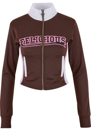 Brown sports jacket with white collar and zipper, featuring pink "FELICIOUS" text, fitted design, and white side panels. Smooth texture.