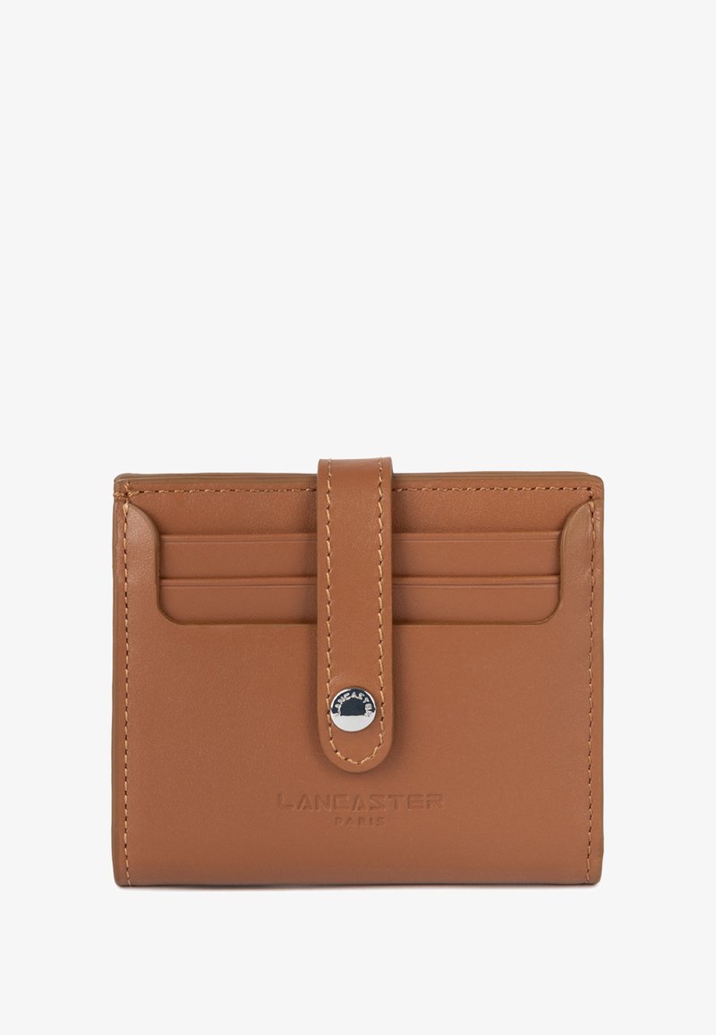 Tan leather cardholder featuring embossed brand logo, four card slots, and a buttoned flap closure. Smooth texture with contrast stitching.