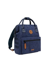 Navy corduroy backpack with leather accents, top handles, adjustable straps, front zip pocket, and a logo patch on the front.